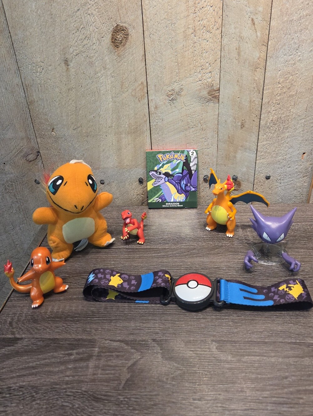 Pokemon Lot Of 7 Bundle Figures Plush Stickers Charmander Charizard Haunter